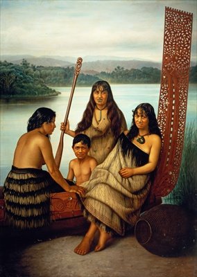 Three Maori girls and a boy sitting on a large carved Maori canoe by a lake 1899